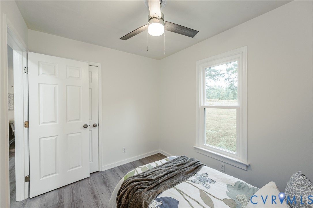 81 Carter Road Cumberland, VA 23040 - Photo 34 of 50 Bedroom featuring wood finished floors and a ceili