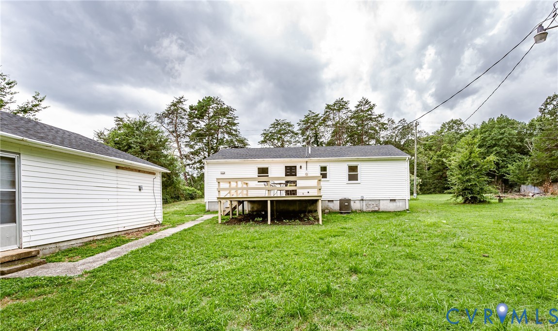 81 Carter Road Cumberland, VA 23040 - Photo 48 of 50 Back of house featuring a deck, a yard, and crawl