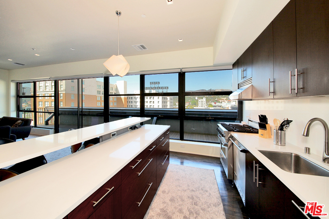 a large kitchen with a large window