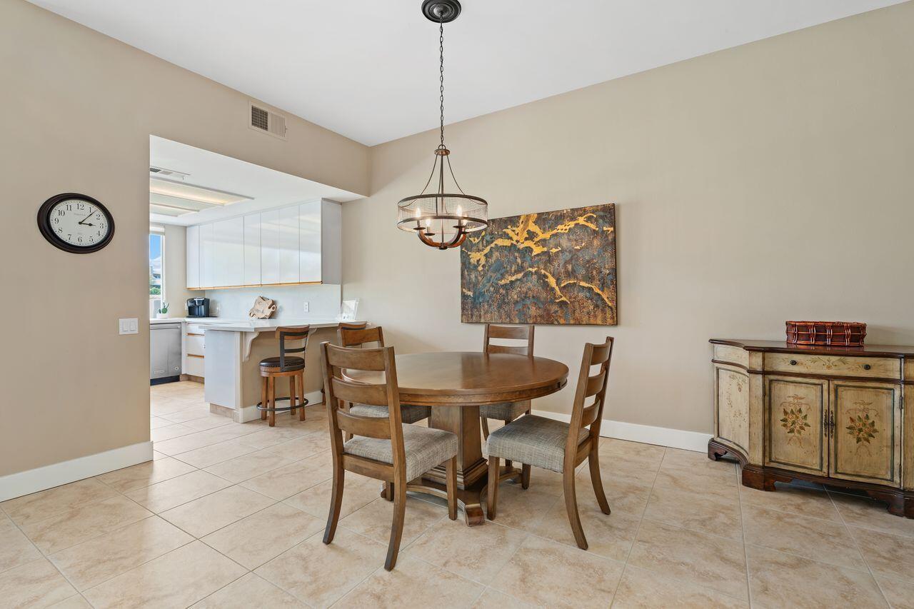20 Pebble Beach Drive Rancho Mirage, CA 92270 - Photo 13 of 41 a dining room with furniture and window