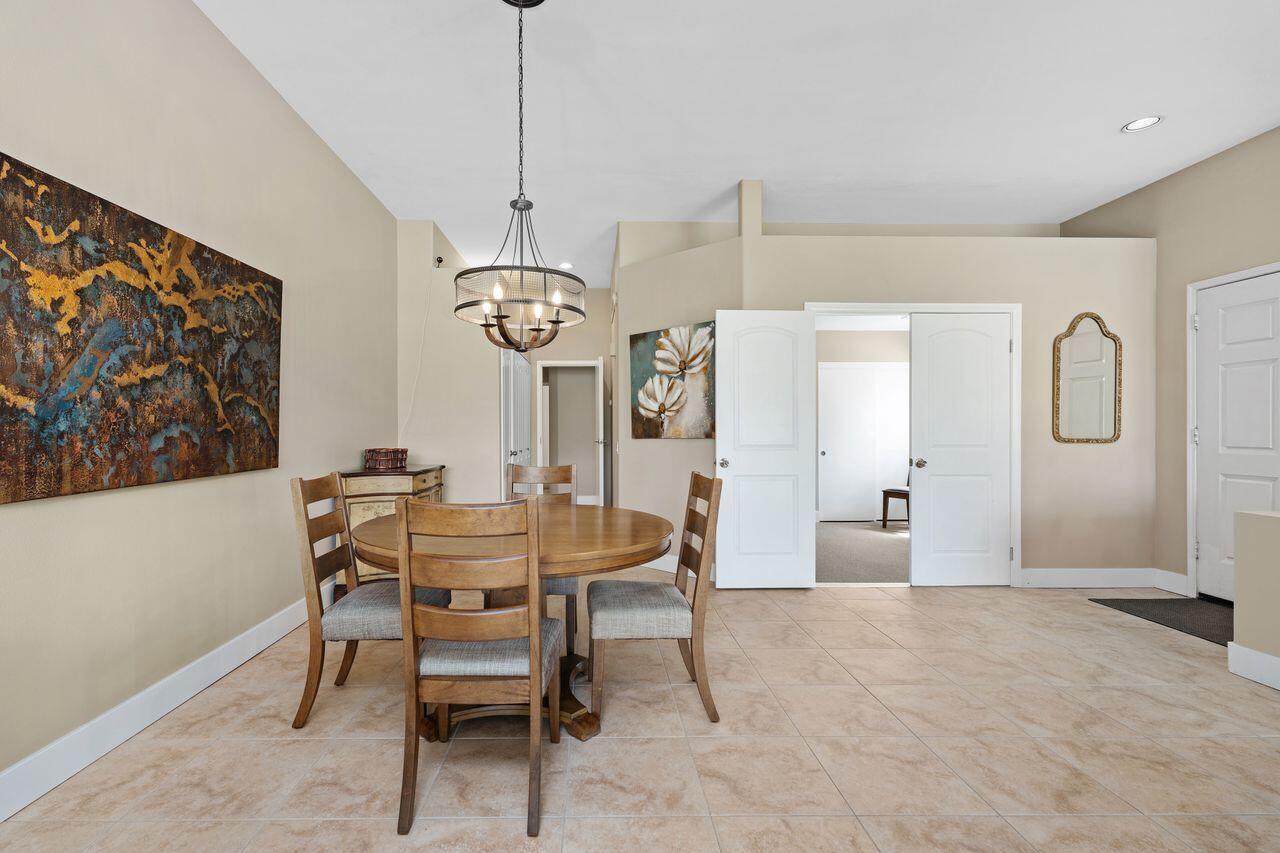 20 Pebble Beach Drive Rancho Mirage, CA 92270 - Photo 14 of 41 a view of a dining room with furniture