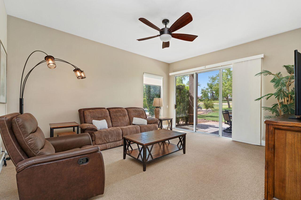 20 Pebble Beach Drive Rancho Mirage, CA 92270 - Photo 6 of 41 a living room with furniture and a large window