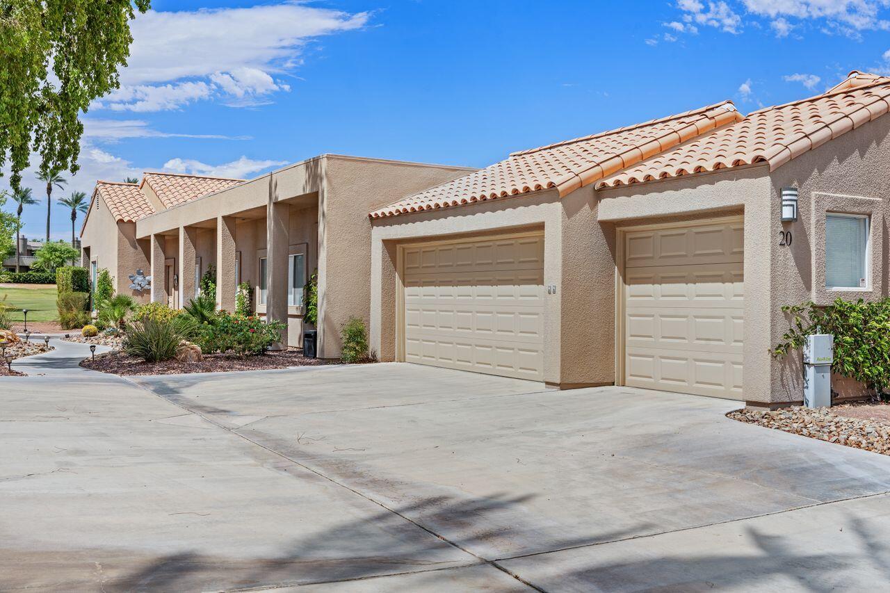 20 Pebble Beach Drive Rancho Mirage, CA 92270 - Photo 7 of 41 a view of house with garage and plants