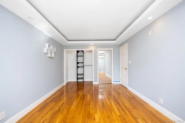 a bathroom with a toilet a sink and a mirror