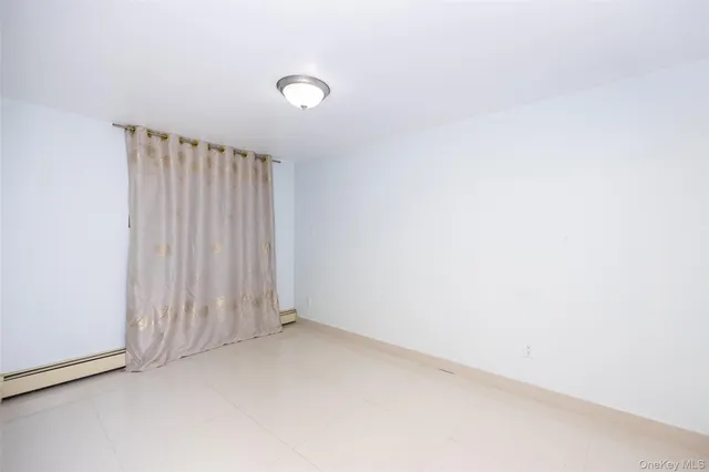 a view of a room with an empty space