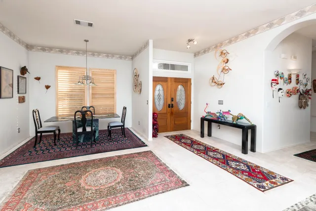 a table and chairs in a patio