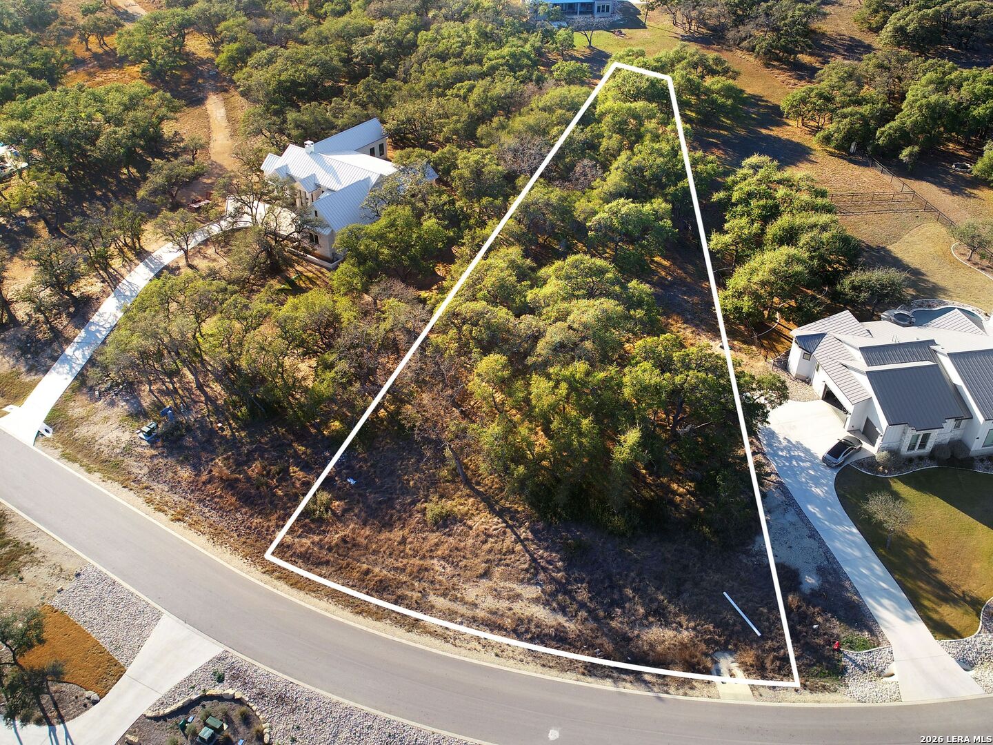 942 Maximino Rdg Road Bulverde, TX 78163 - Photo 4 of 13 a view of a yard
