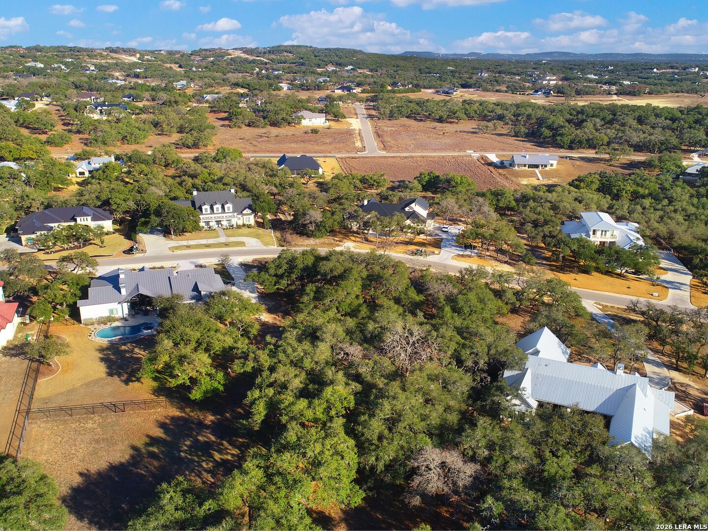 942 Maximino Rdg Road Bulverde, TX 78163 - Photo 10 of 13 an aerial view of residential houses with outdoor space and trees