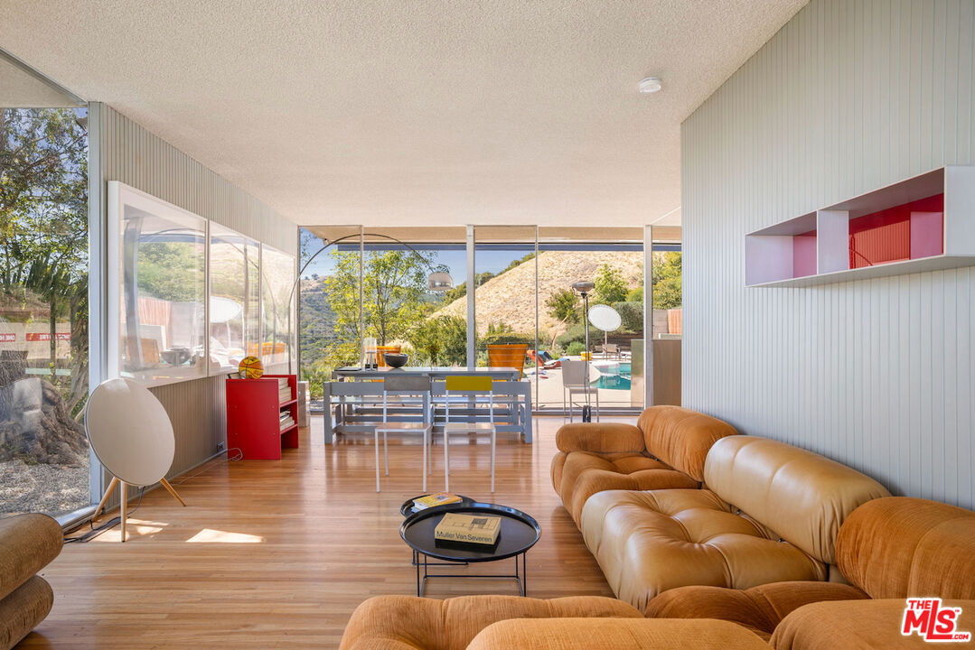 1531 North Tigertail Road Los Angeles, CA 90049 - Photo 5 of 24 a living room with furniture and a large window
