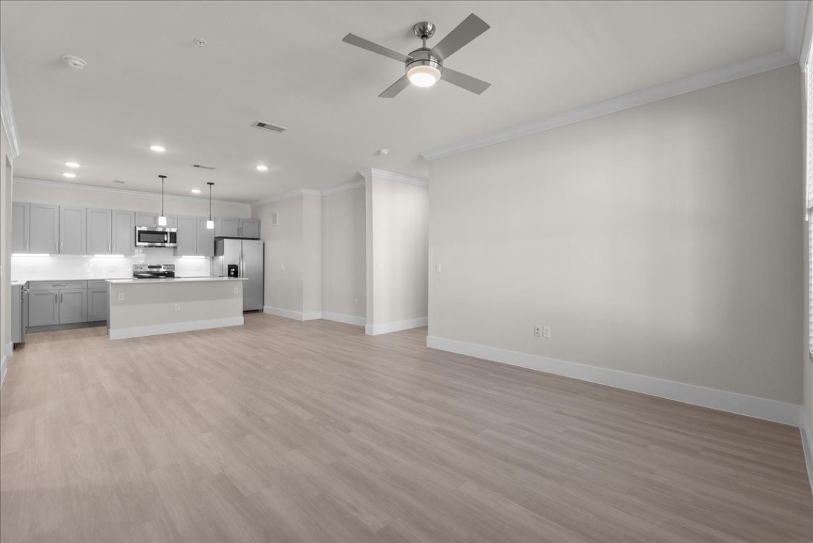 540 Hobbs Road, Unit C1 League City, TX 77573 - Photo 5 of 39 a view of a kitchen with a sink and a stove top oven