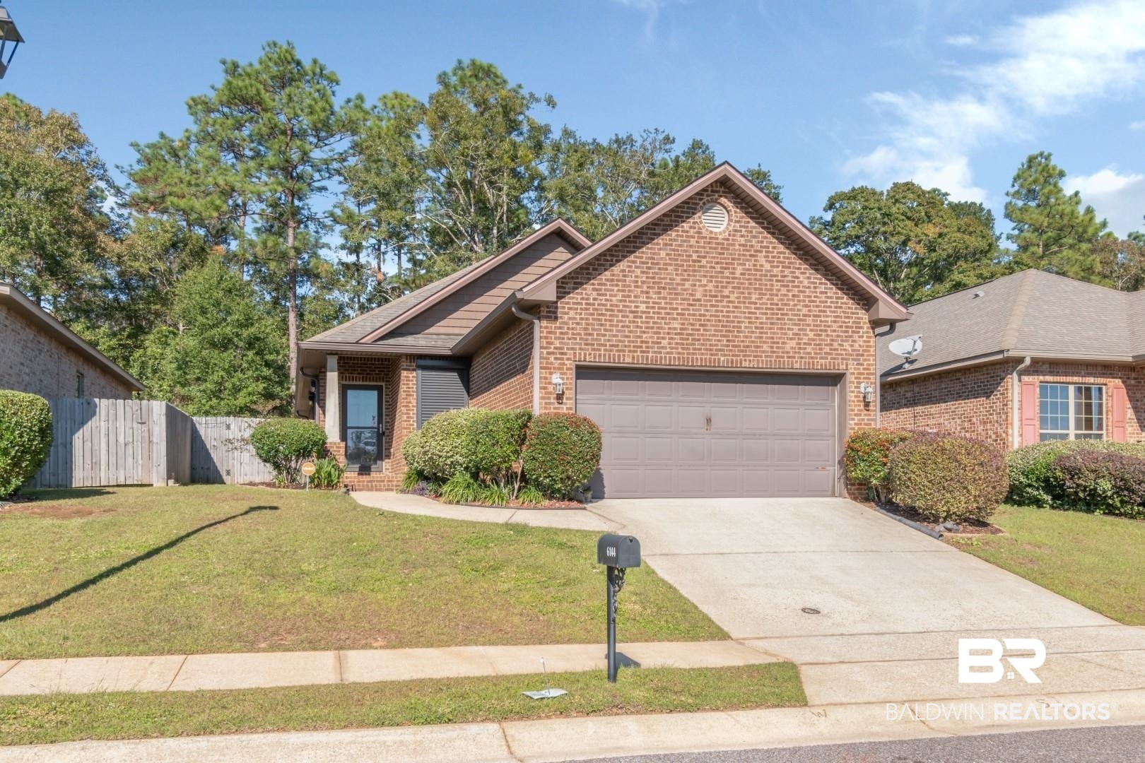 6144 Whitebark Drive Mobile, AL 36693 - Photo 33 of 33 View of front of home with a garage and a front lawn