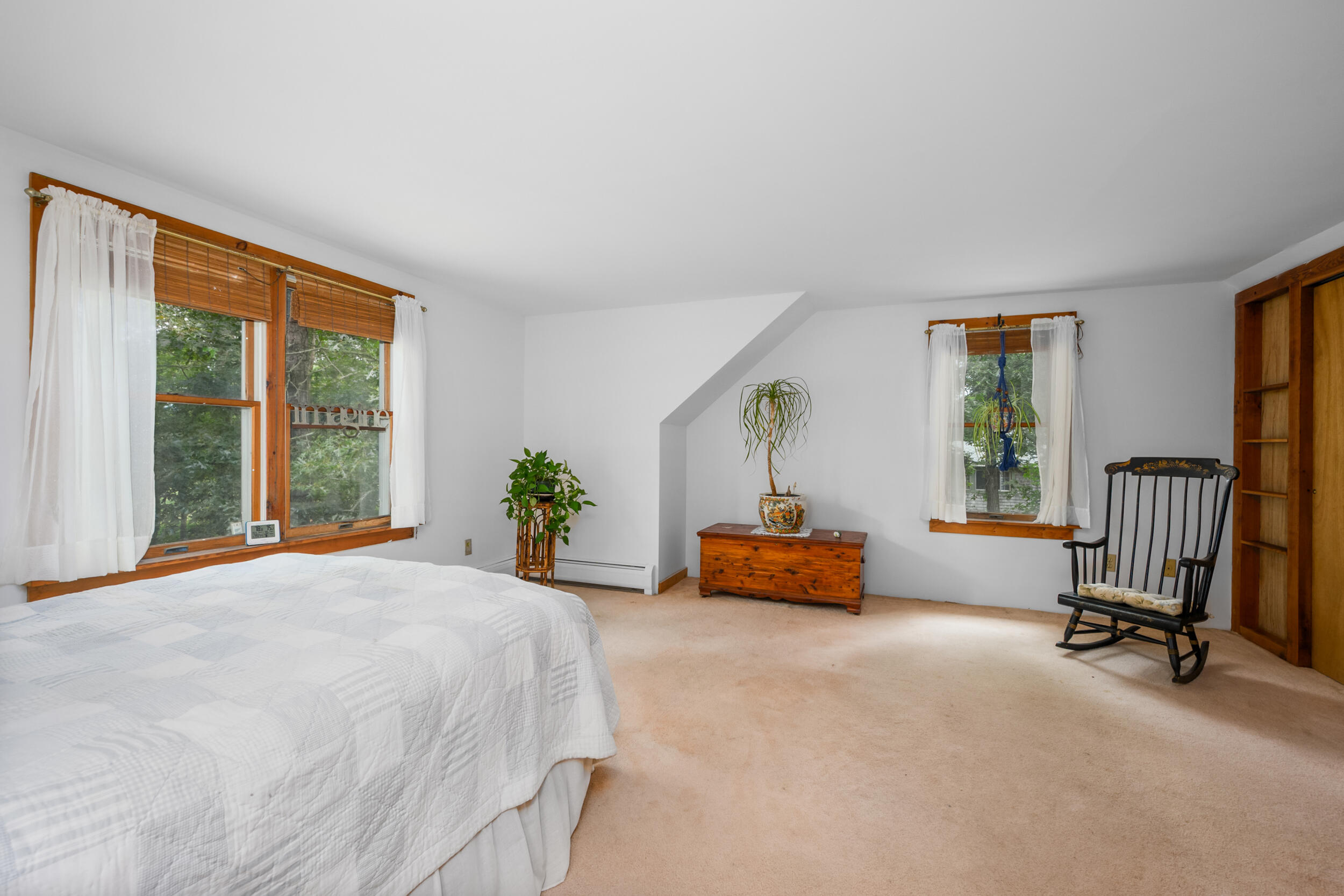 153 Red Fawn Road Brewster, MA 02631 - Photo 21 of 28 a bedroom with furniture and a large window