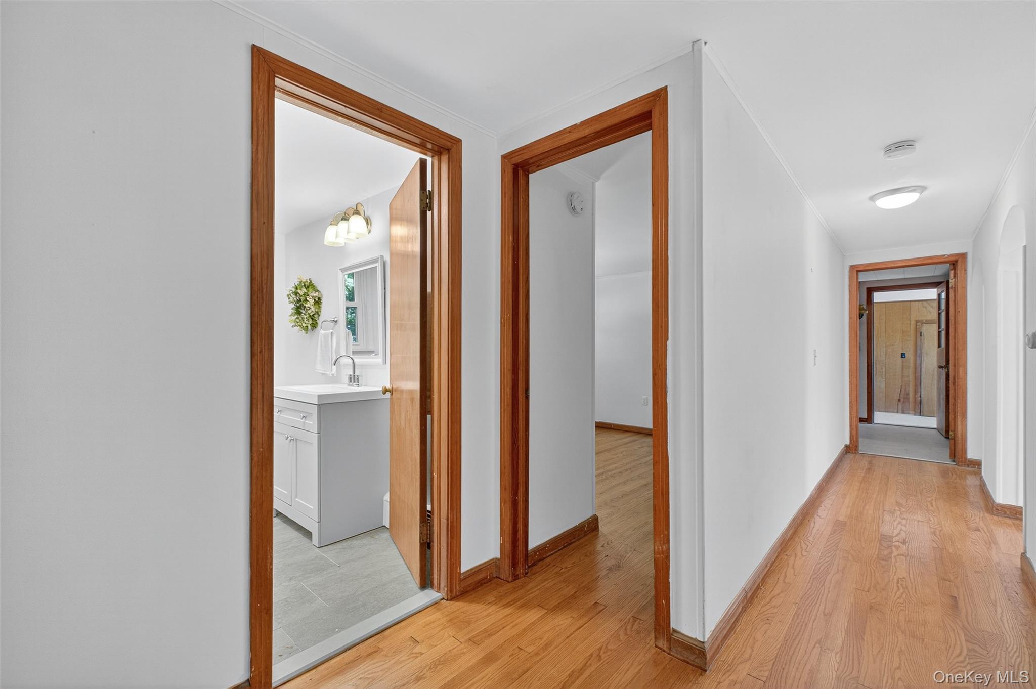86 Gardnertown Road Newburgh, NY 12550 - Photo 17 of 33 a view of a hallway with wooden floor