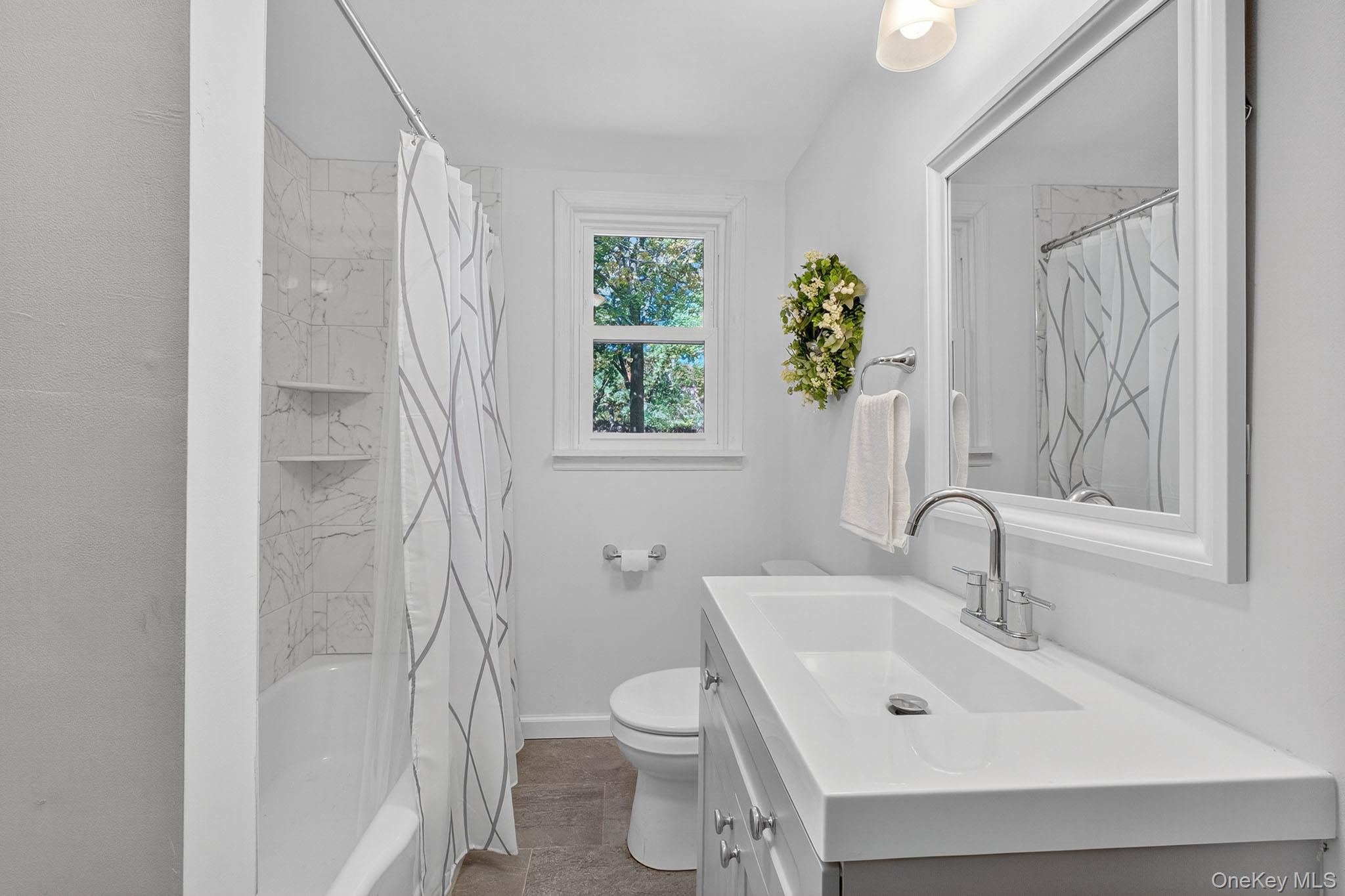 86 Gardnertown Road Newburgh, NY 12550 - Photo 20 of 33 a bathroom with a sink toilet and shower