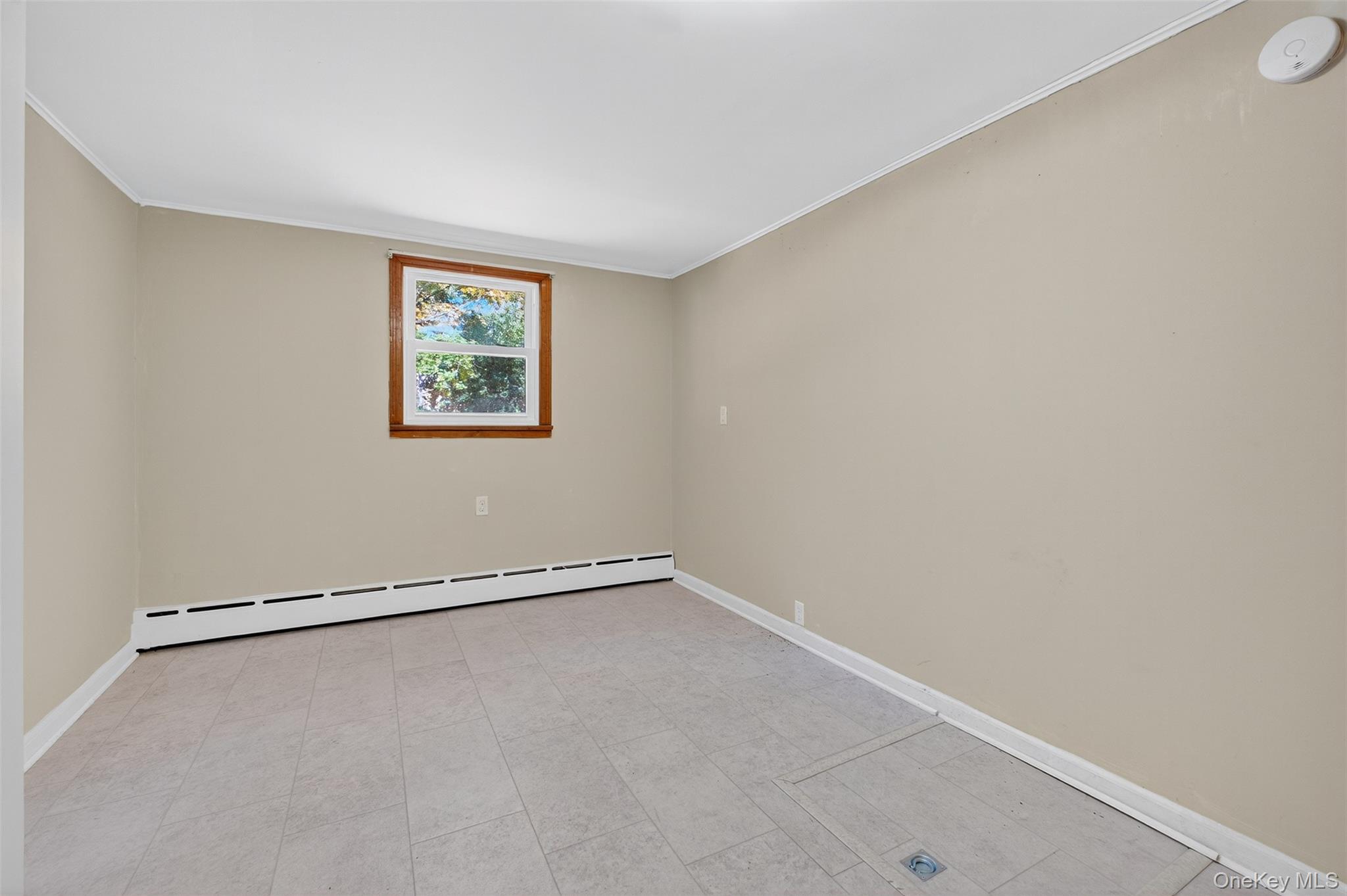 86 Gardnertown Road Newburgh, NY 12550 - Photo 22 of 33 an empty room with a window