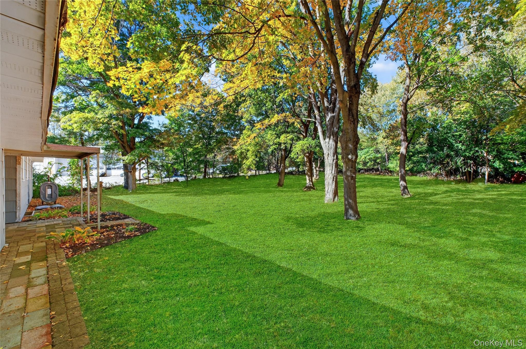 86 Gardnertown Road Newburgh, NY 12550 - Photo 28 of 33 a view of a backyard with a garden