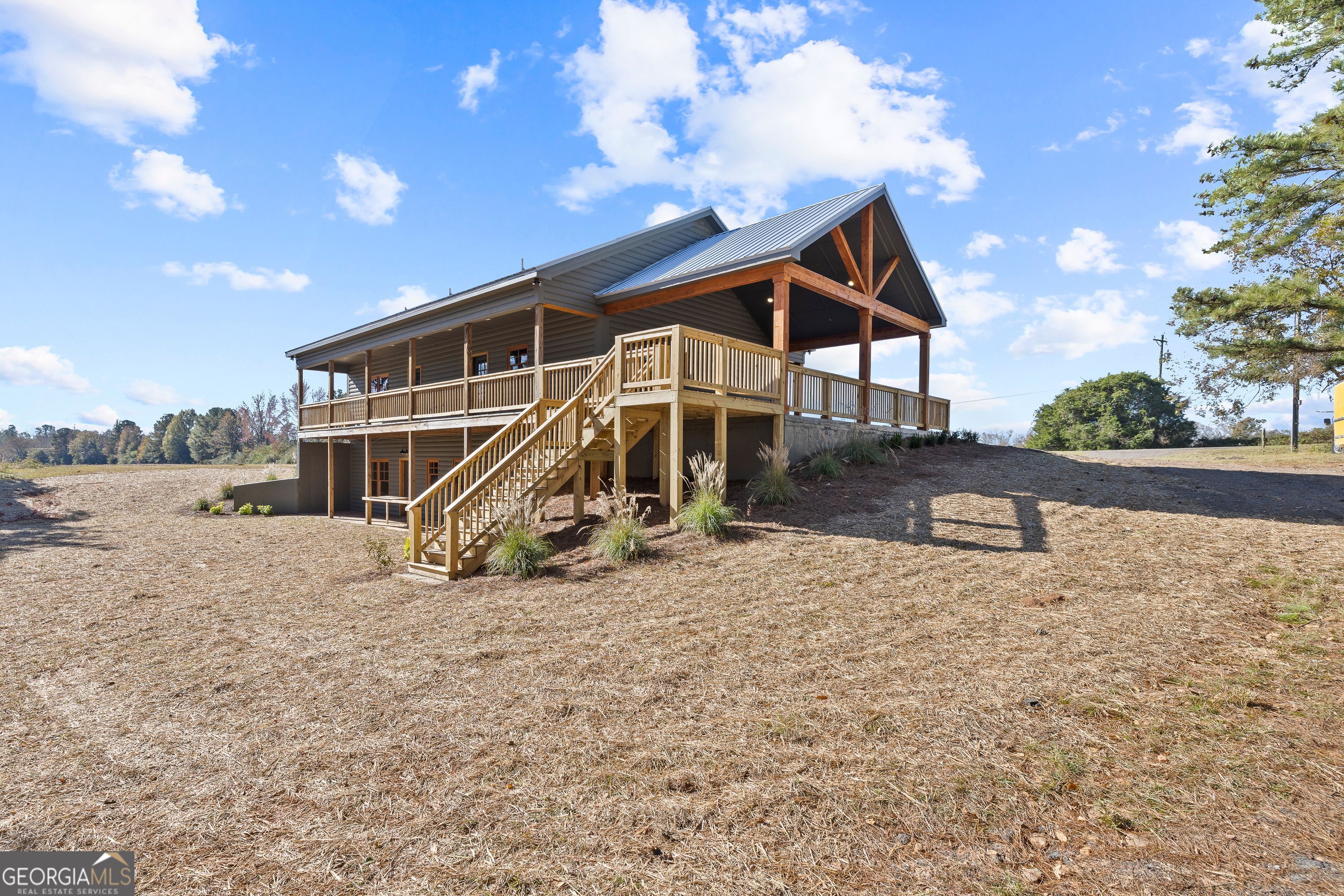 130 North Wesley Chapel Road Eatonton, GA 31024 - Photo 13 of 45 a view of a house with a yard