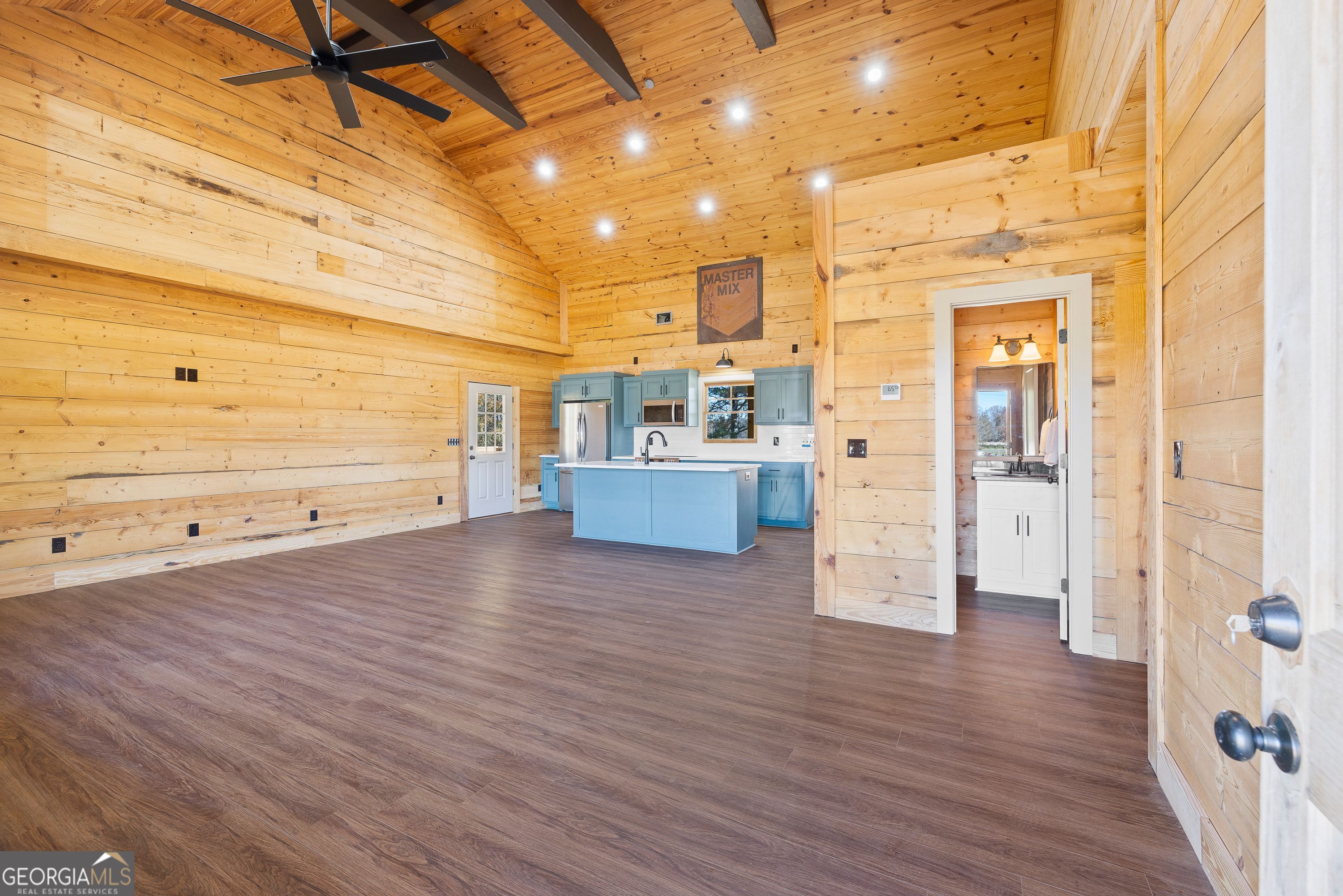 130 North Wesley Chapel Road Eatonton, GA 31024 - Photo 18 of 45 a view of a living room with hardwood floor