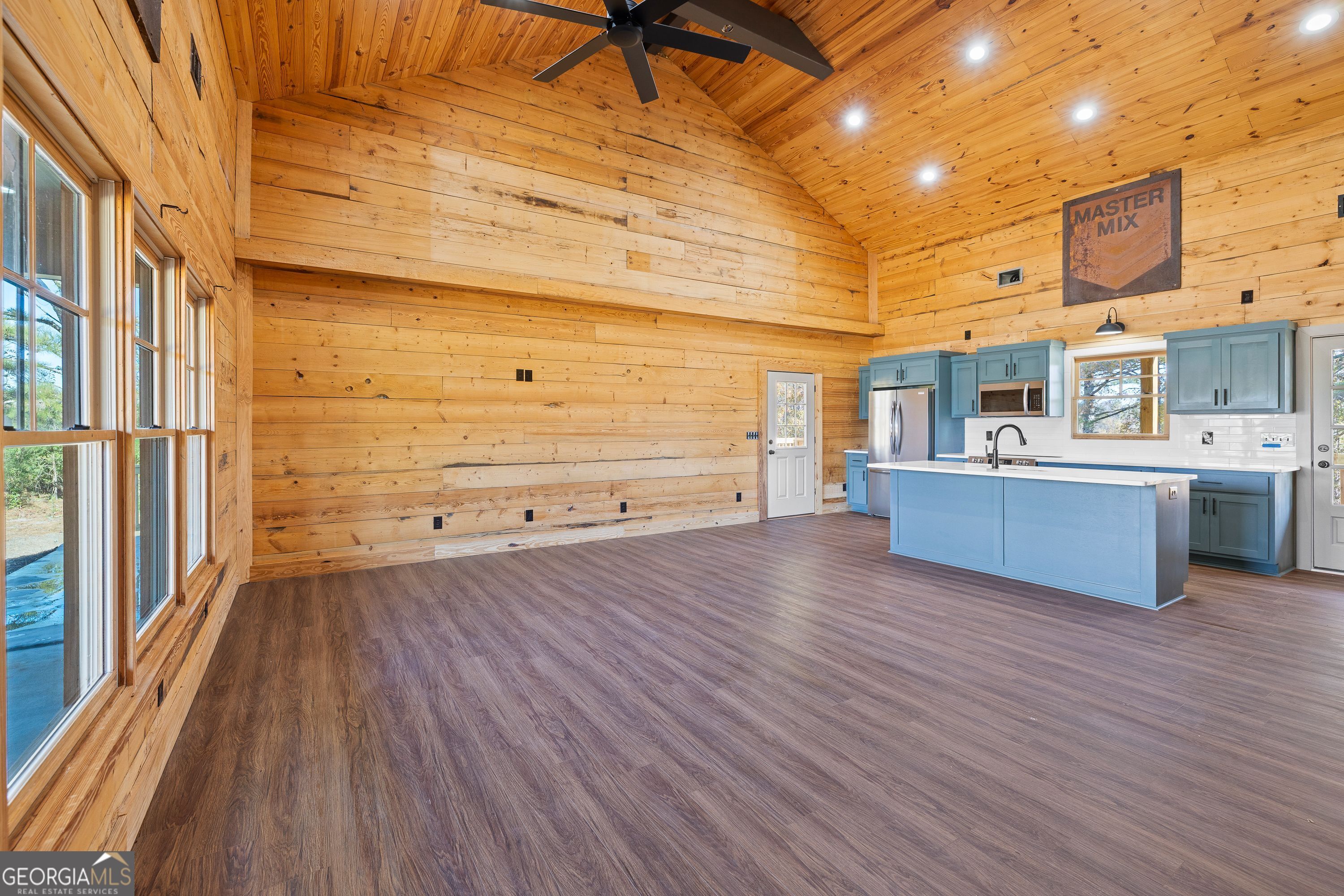 130 North Wesley Chapel Road Eatonton, GA 31024 - Photo 20 of 45 a view of a room with wooden floor and furniture