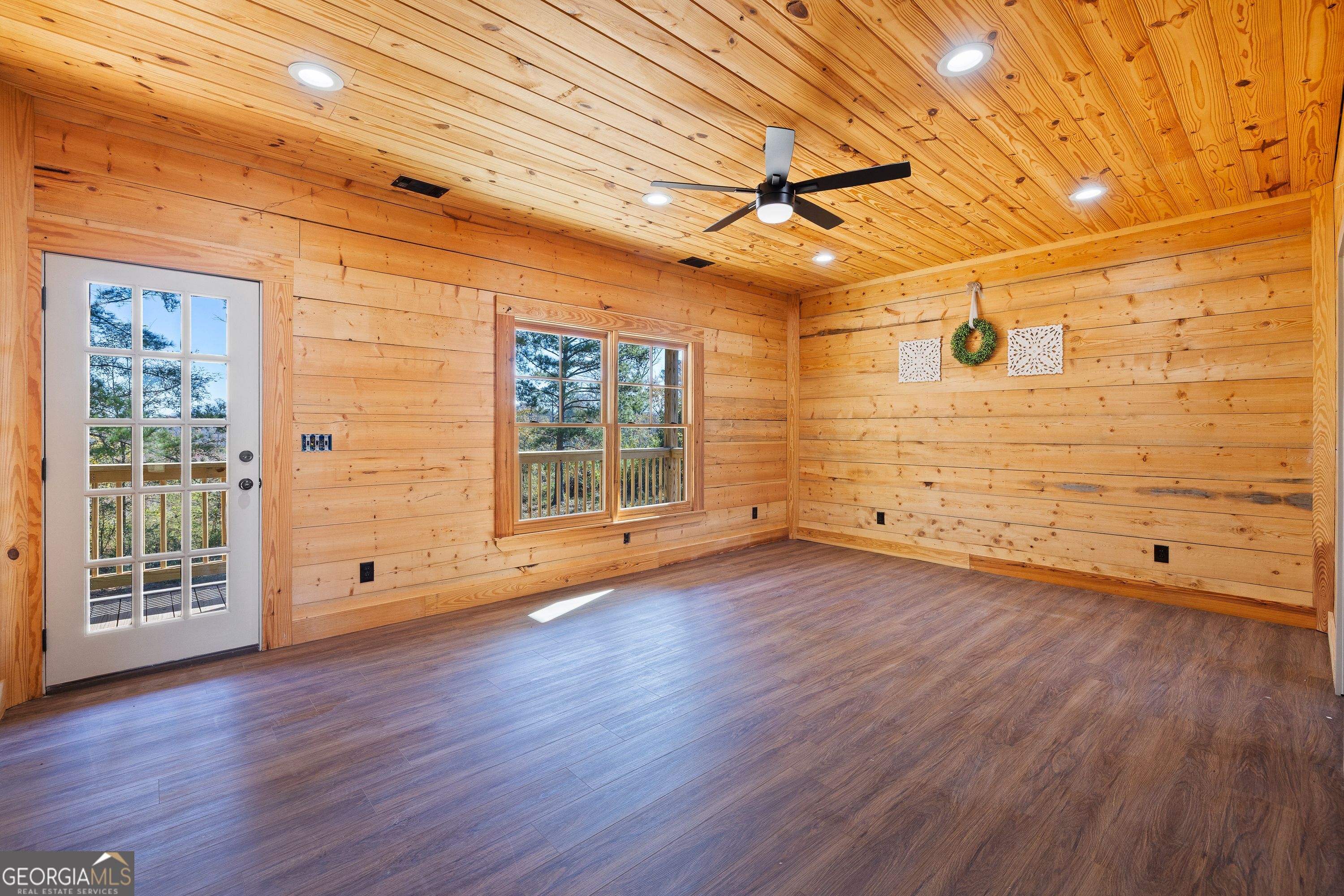 130 North Wesley Chapel Road Eatonton, GA 31024 - Photo 28 of 45 a view of a livingroom with wooden floor