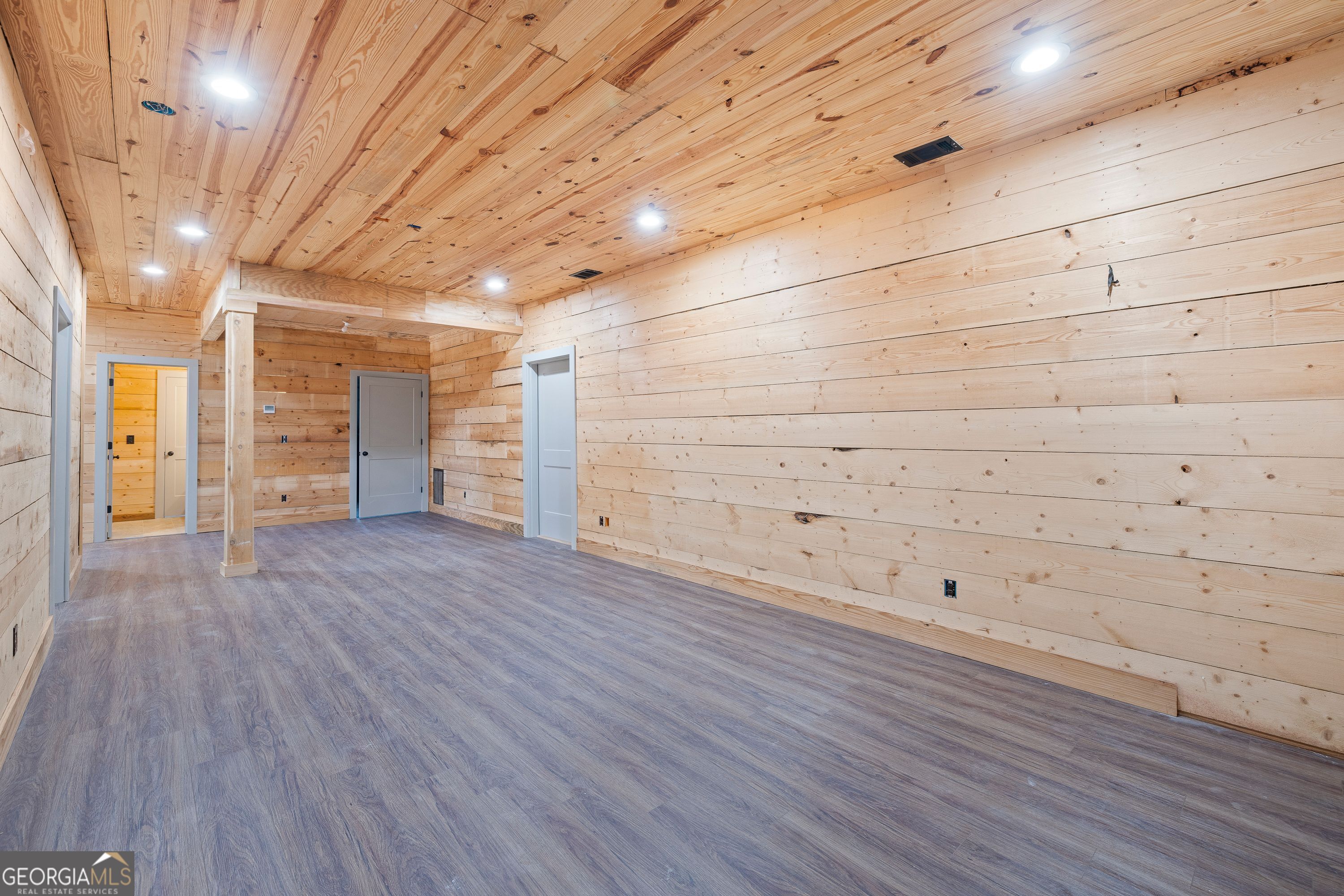 130 North Wesley Chapel Road Eatonton, GA 31024 - Photo 42 of 45 a view of empty room with wooden floor