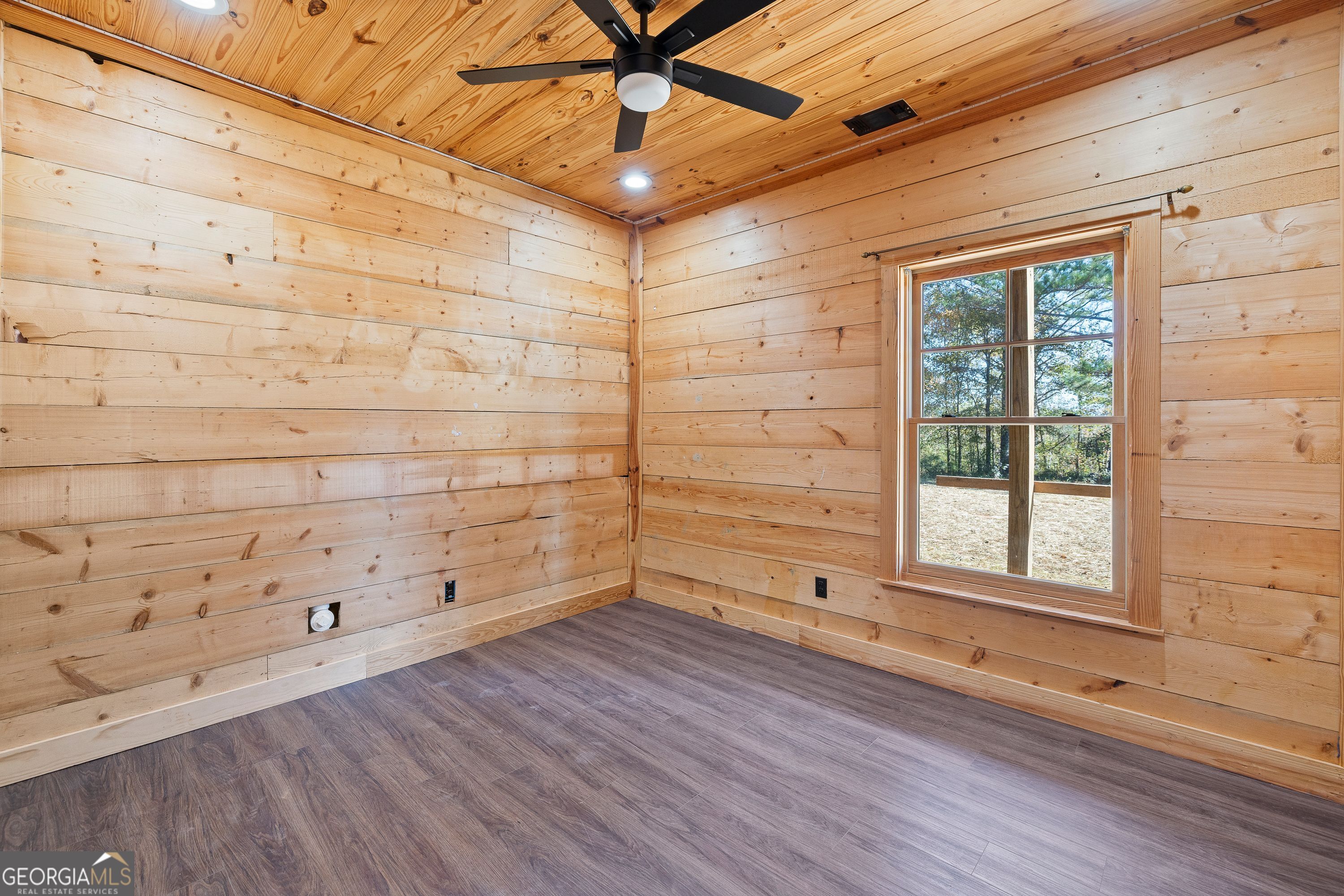 130 North Wesley Chapel Road Eatonton, GA 31024 - Photo 43 of 45 a view of a room with window and wooden floor