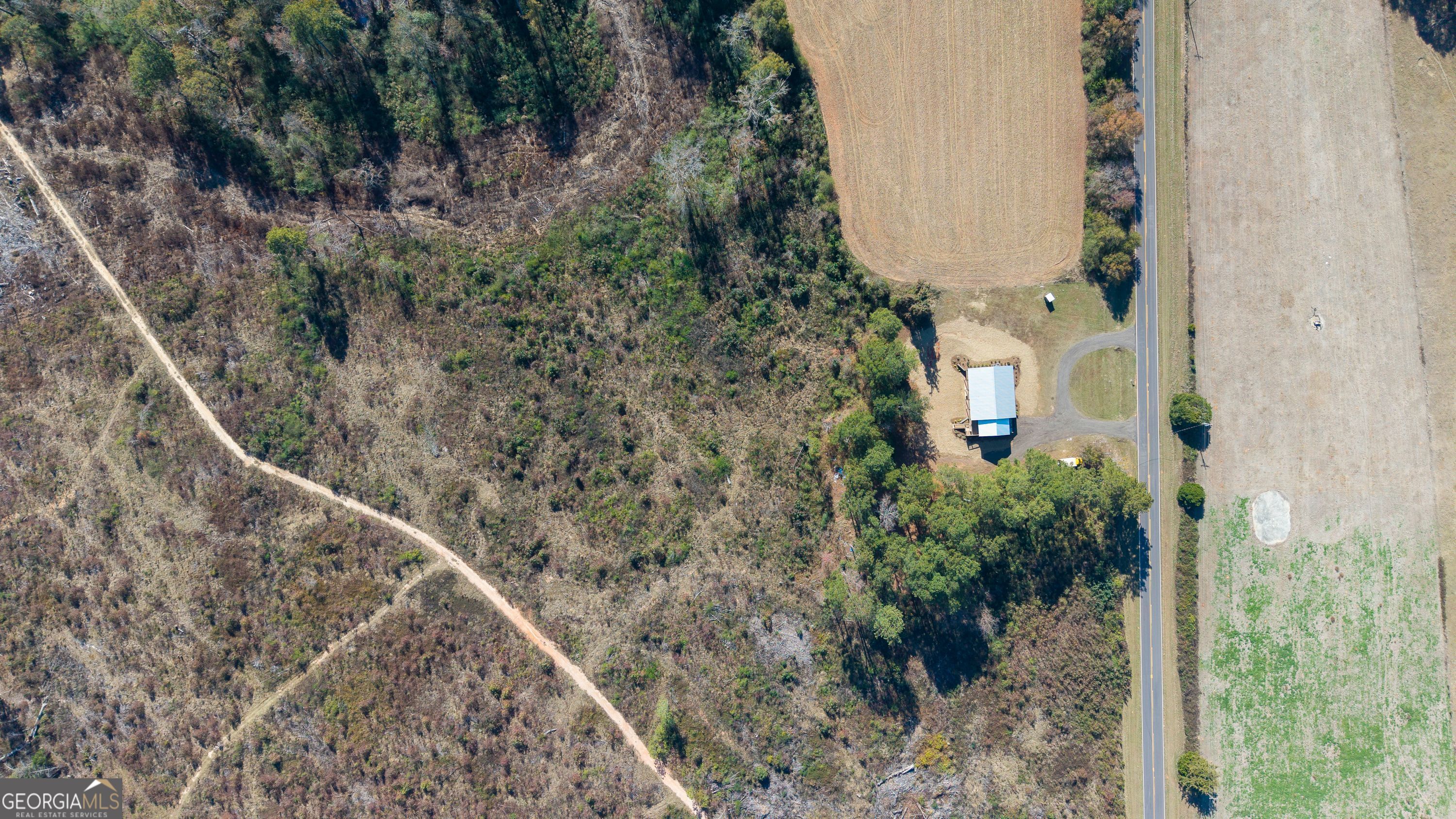 130 North Wesley Chapel Road Eatonton, GA 31024 - Photo 5 of 45 a view of a yard from a balcony