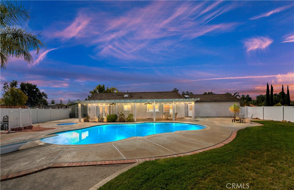 18948 Orrick Avenue Riverside, CA 92508 - Photo 1 of 1 a view of a swimming pool with an outdoor seating
