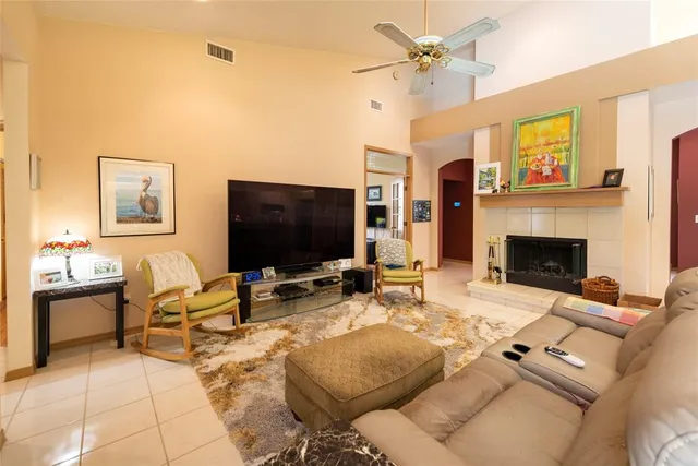 a bed room with a bed and a chair