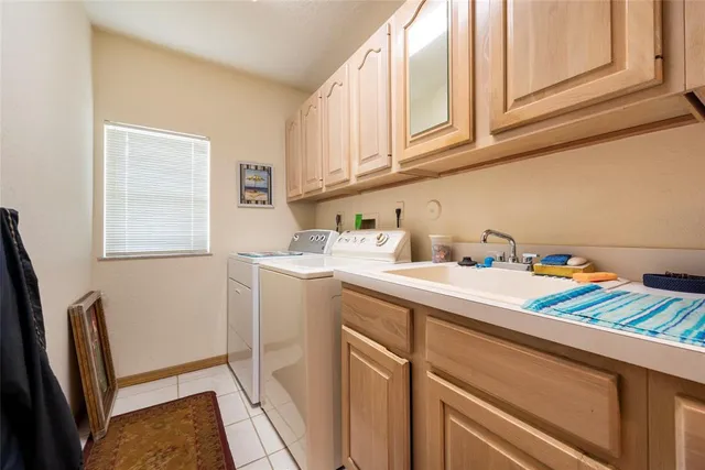 a bedroom with a bed and ceiling fan