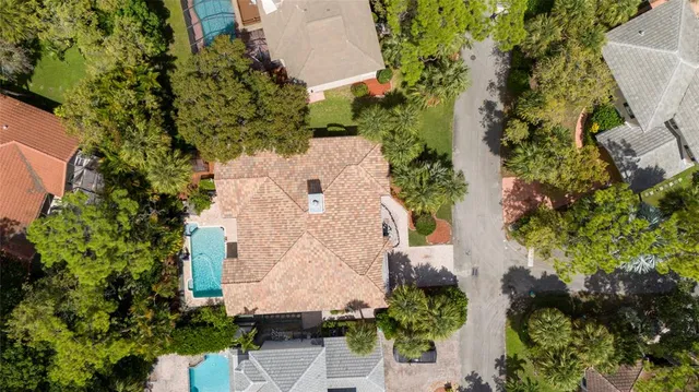 an aerial view of a house with outdoor space