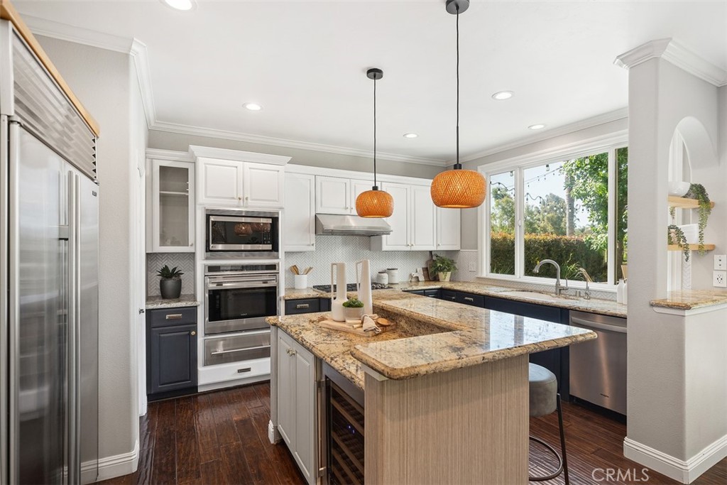 6 Calella Laguna Niguel, CA 92677 - Photo 10 of 28 a kitchen with stainless steel appliances granite countertop a stove a sink and a refrigerator