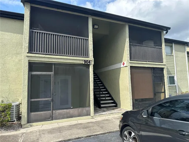 a car parked in front of a house
