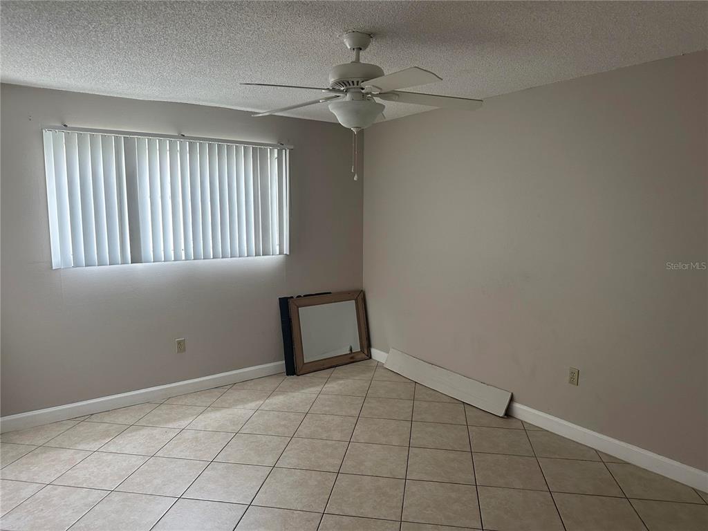 904 Lake Destiny Road, Unit G Altamonte Springs, FL 32714 - Photo 11 of 22 a view of an empty room with a window