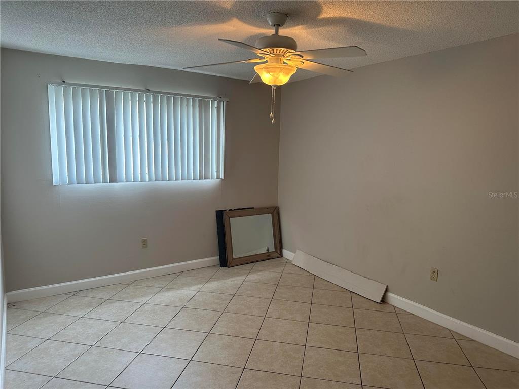 904 Lake Destiny Road, Unit G Altamonte Springs, FL 32714 - Photo 9 of 22 a view of an empty room with a window