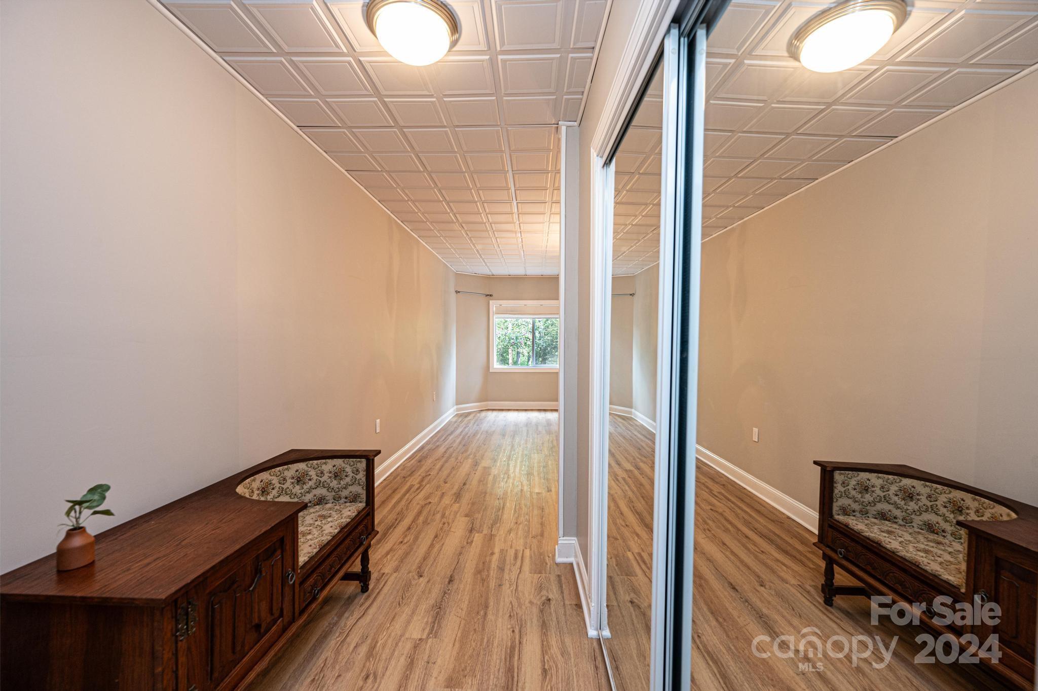 5366 Beacon Ridge Drive Granite Falls, NC 28630 - Photo 38 of 47 a view of hallway with wooden floor