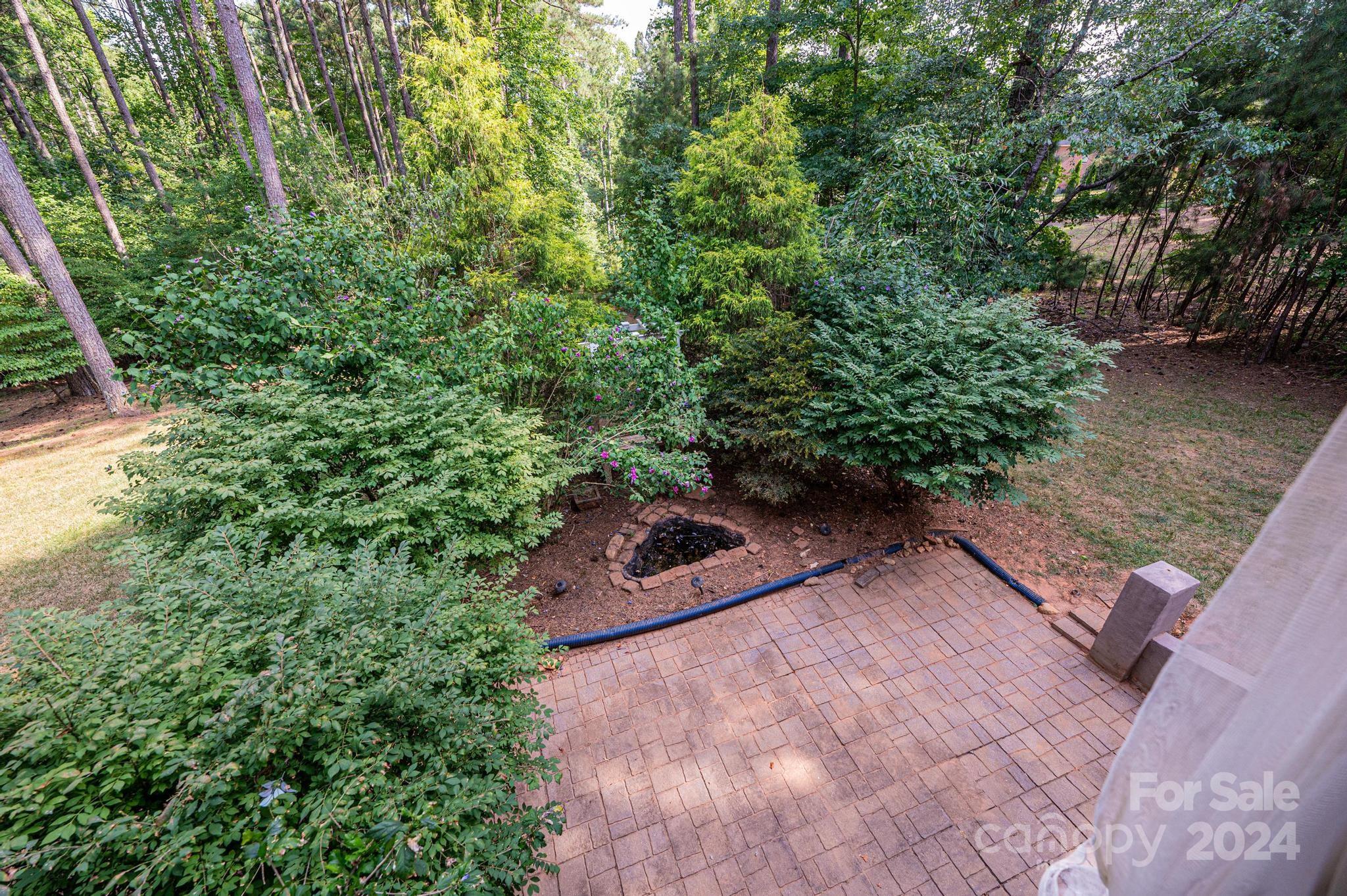 5366 Beacon Ridge Drive Granite Falls, NC 28630 - Photo 47 of 47 a backyard of a house with lots of green space
