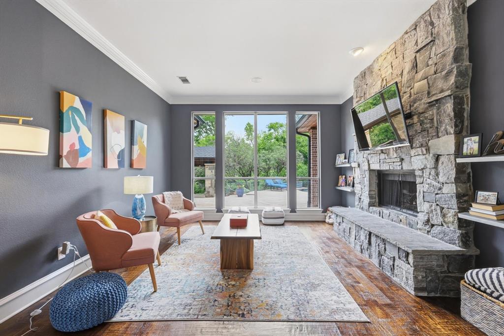 462 Copperstone Trail Coppell, TX 75019 - Photo 11 of 38 a living room with furniture and a fireplace