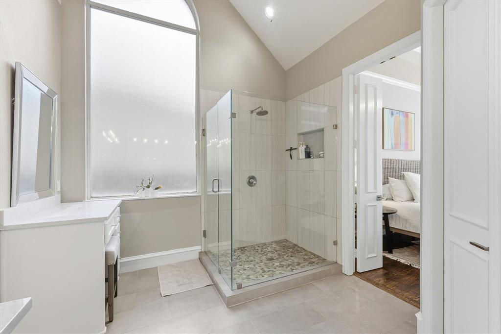 462 Copperstone Trail Coppell, TX 75019 - Photo 16 of 38 a bathroom with a shower and a sink