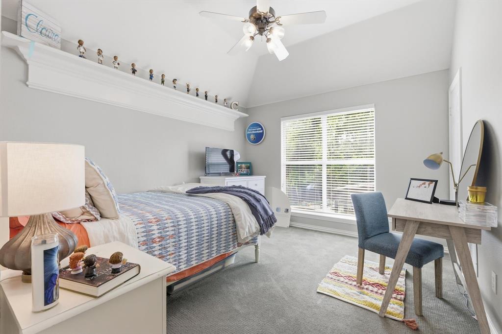 462 Copperstone Trail Coppell, TX 75019 - Photo 19 of 38 a bedroom with a bed and a window