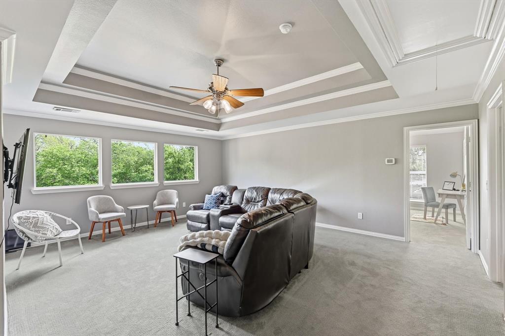 462 Copperstone Trail Coppell, TX 75019 - Photo 22 of 38 a living room with furniture and a large window