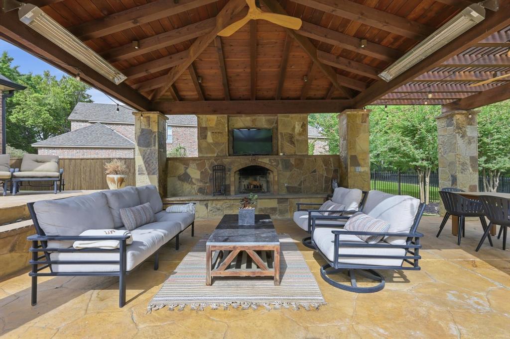 462 Copperstone Trail Coppell, TX 75019 - Photo 28 of 38 a living room with furniture and a fireplace