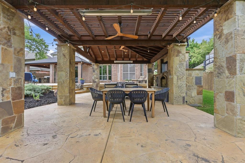 462 Copperstone Trail Coppell, TX 75019 - Photo 30 of 38 a building outdoor space with patio furniture and potted plants