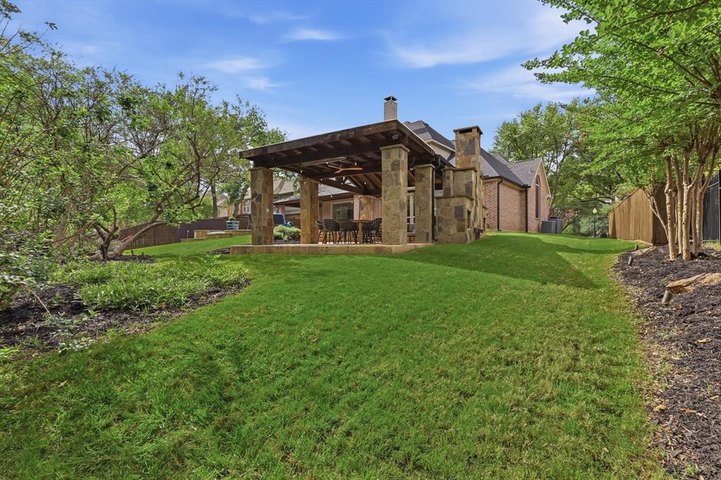 462 Copperstone Trail Coppell, TX 75019 - Photo 31 of 38 a front view of a house with a big yard