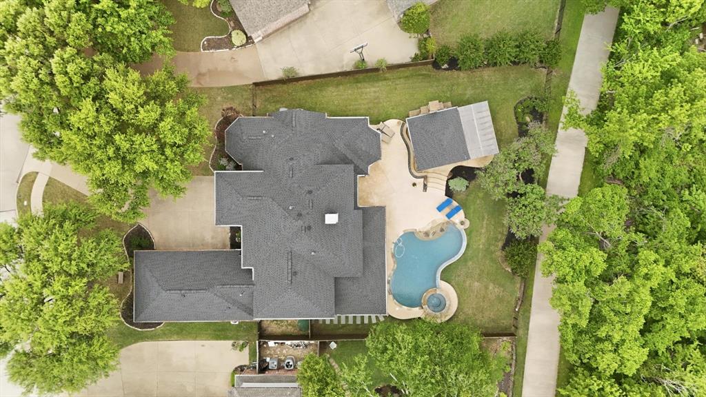 462 Copperstone Trail Coppell, TX 75019 - Photo 36 of 38 an aerial view of a house with a yard and lake view