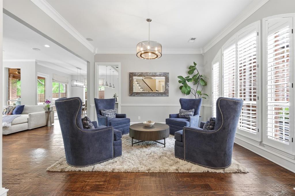 462 Copperstone Trail Coppell, TX 75019 - Photo 4 of 38 a living room with furniture wooden floor and a large window