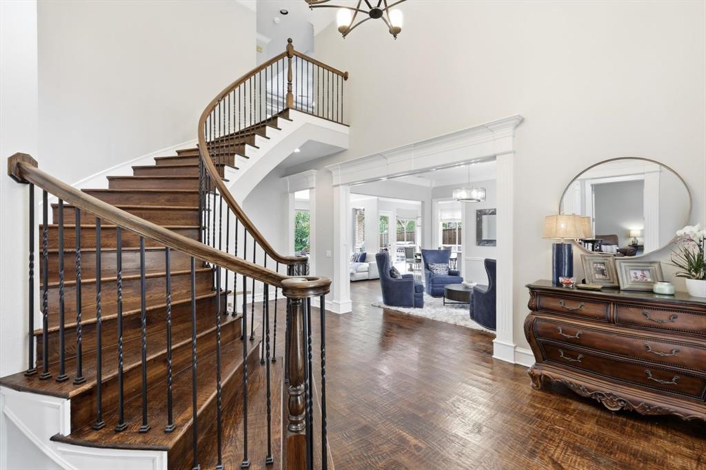 462 Copperstone Trail Coppell, TX 75019 - Photo 6 of 38 a view of entryway livingroom and hall with wooden floor
