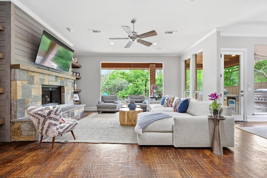 462 Copperstone Trail Coppell, TX 75019 - Photo 9 of 38 a living room with furniture fireplace and a large window