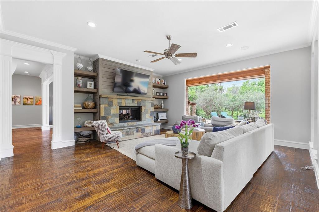 462 Copperstone Trail Coppell, TX 75019 - Photo 10 of 38 a living room with furniture fireplace and flat screen tv