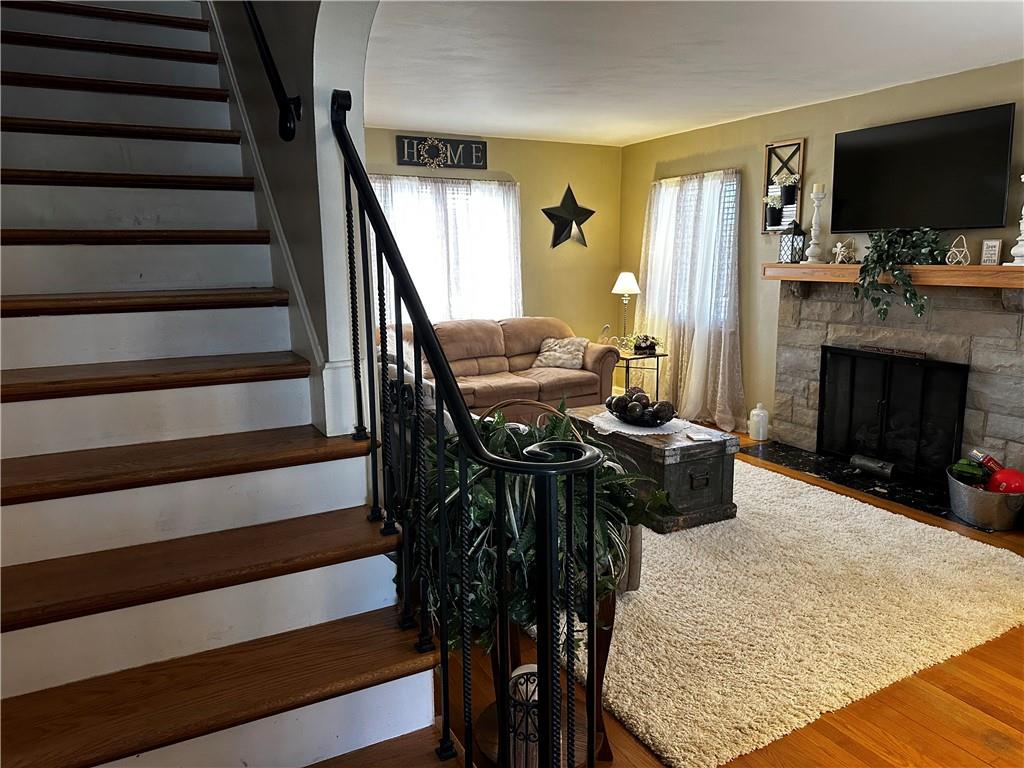 408 Craigdell Road New Kensington, PA 15068 - Photo 4 of 12 a living room with furniture and a fireplace